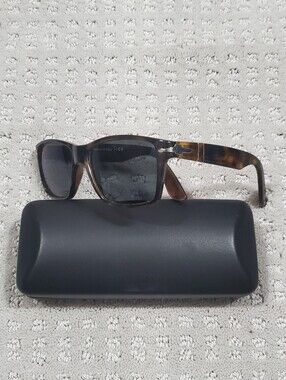 Persol RX sunglasses in a Havana frame color or tortoise-style Unisex